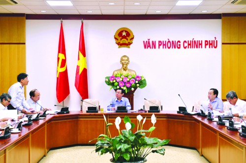 Chủ tịch VAMC Nguyễn Quốc Hùng báo cáo Phó Thủ tướng Vương Đình Huệ về tình hình xử lý nợ xấu