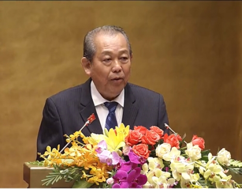 Phó Thủ tướng Thường trực Chính phủ Trương Hòa Bình báo cáo trước Quốc hội